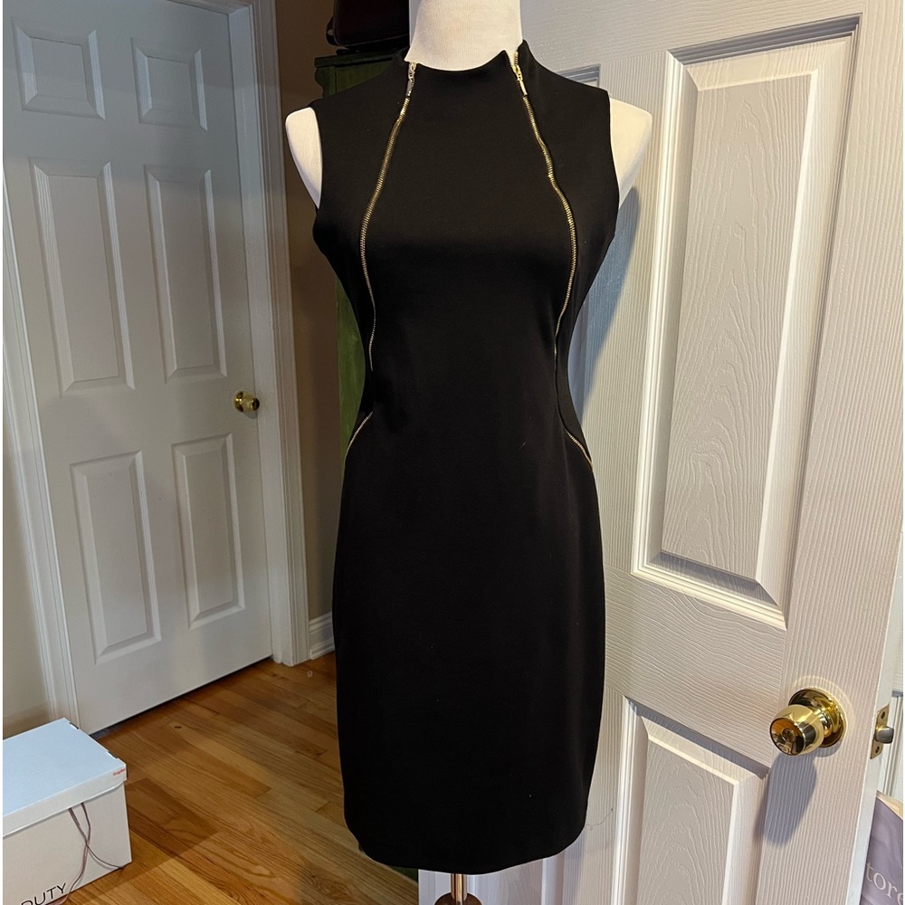 Calvin Klein size 6. Black body-con